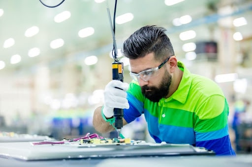 Photo of man working on the shop floor